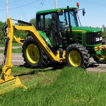 Tractor mowing the roadside